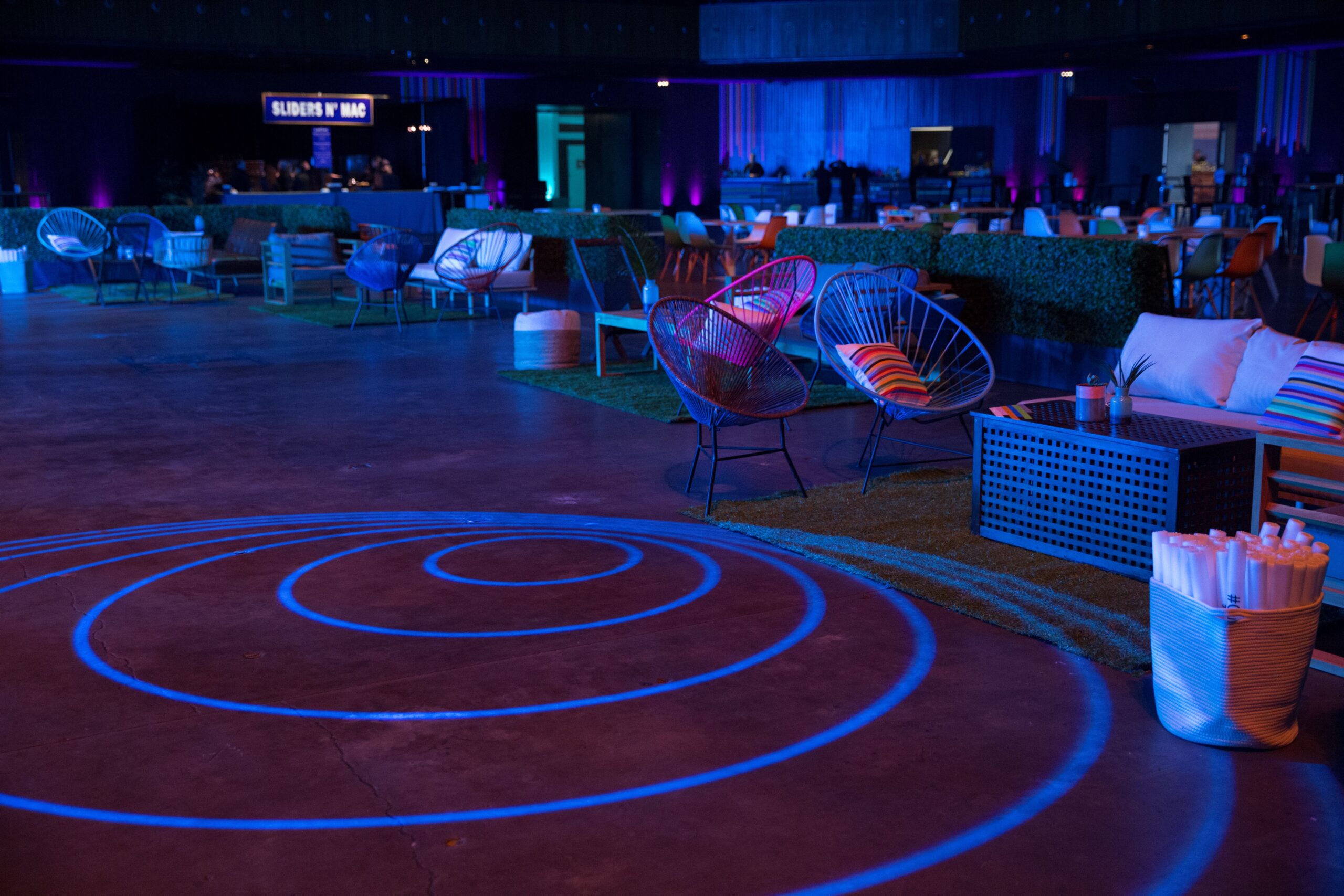 Guests painted freely on a wall-sized canvas at Slack's CSR event