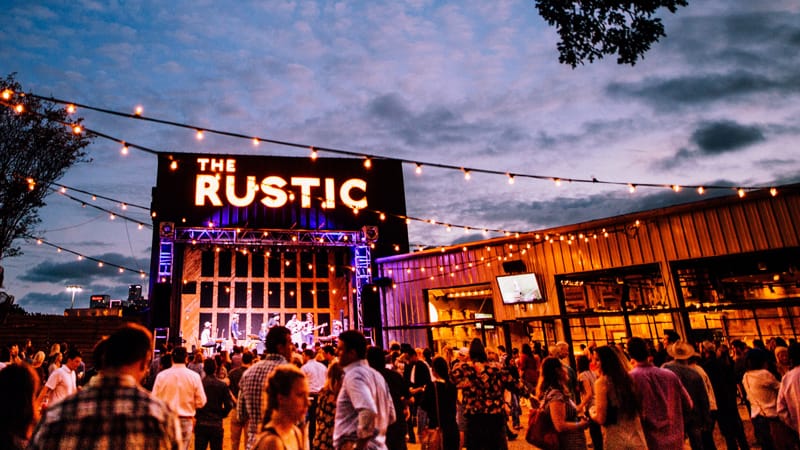 Dallas event venue The Rustic backyard ambiance and hospitality at sunset